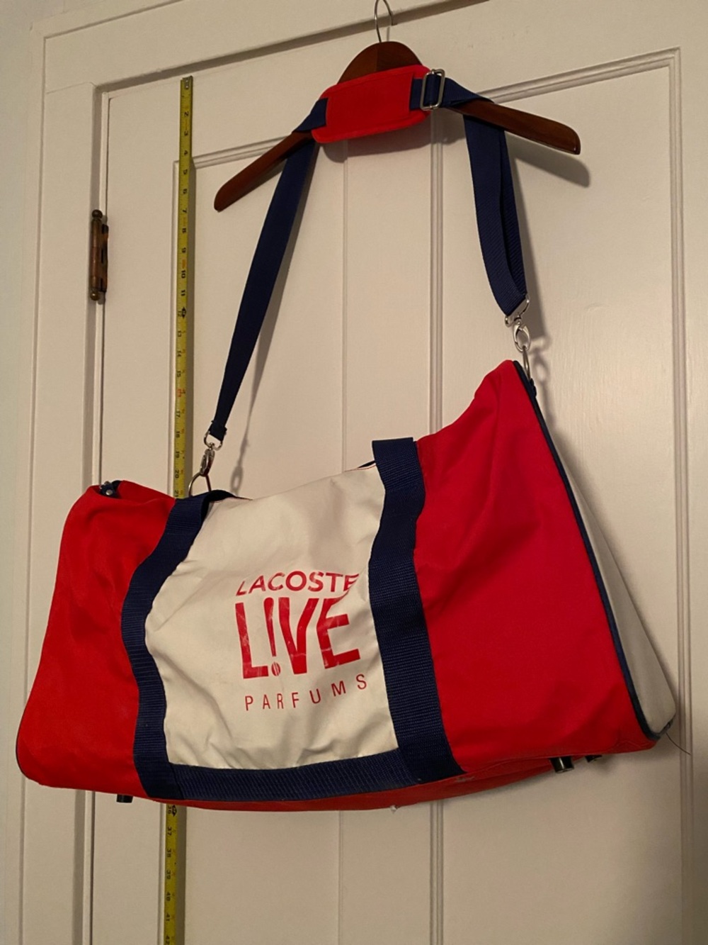 Lacoste duffel bag in red white and blue